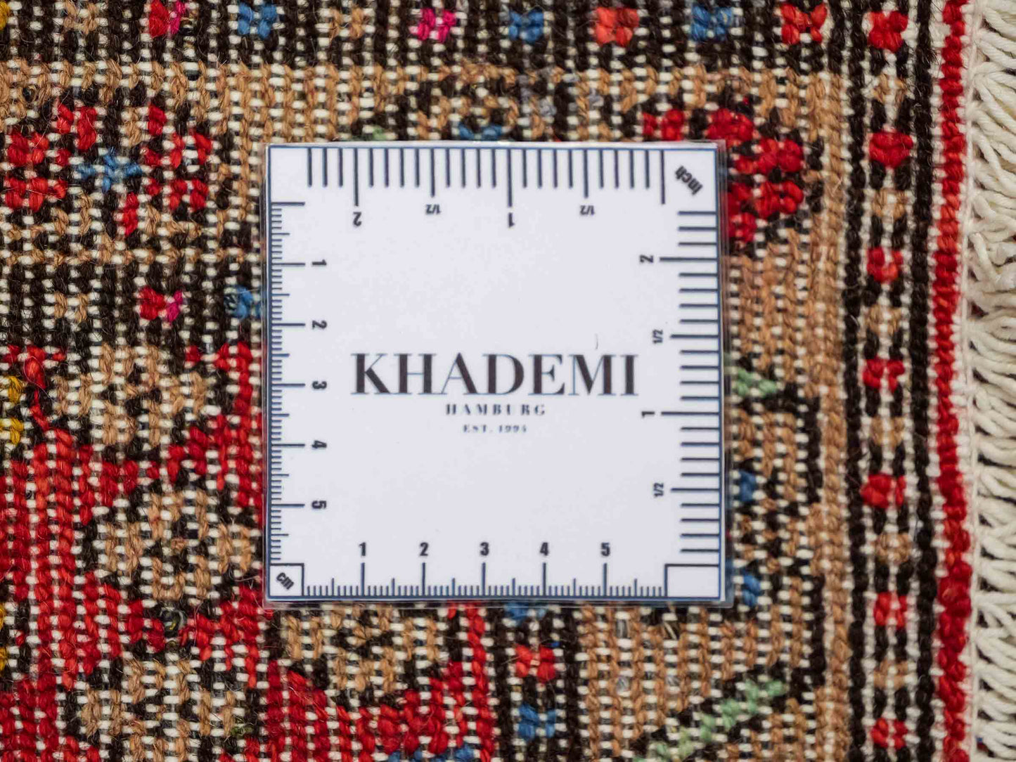 Handgeknüpfter, persischer Hamedan Dorfteppich aus Wolle von Khademi. Größe: 75 x 50 cm. Farbe: Rot. Verkauf durch JUPITER Intl.