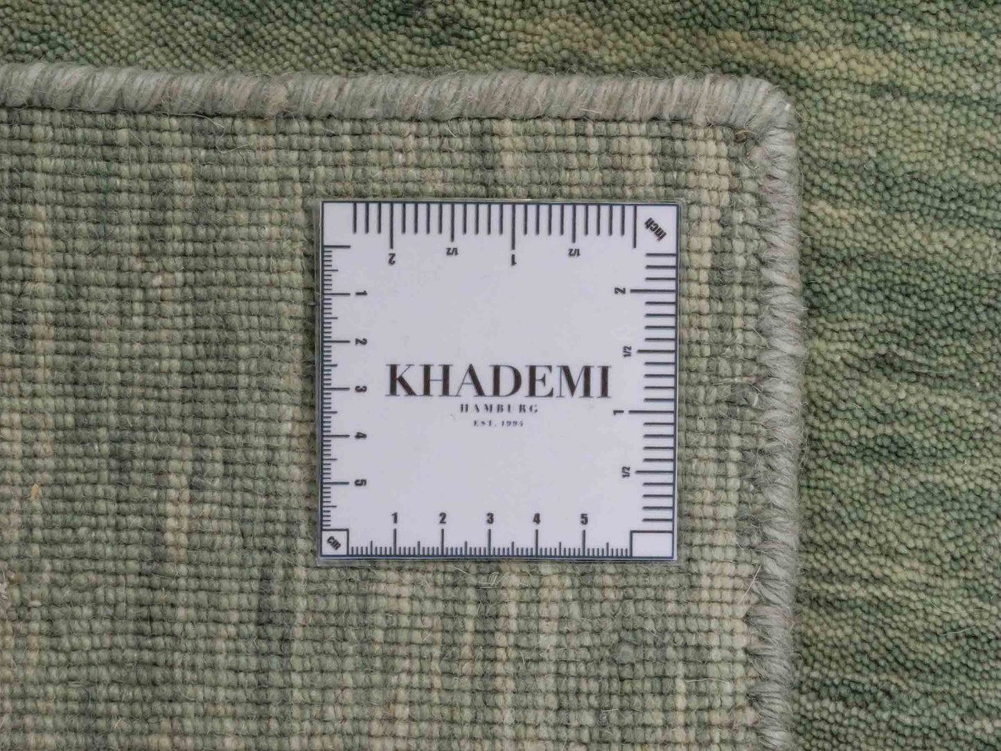 Moderner, Handloom Gabbeh Orientteppich von Khademi aus Wolle, mintgrün. Einfarbiges Uni-Design. Produziert in Indien. Größe: 93x60cm. Teppichnummer: KB4-1568. Verkauf durch Jupiter Intl.