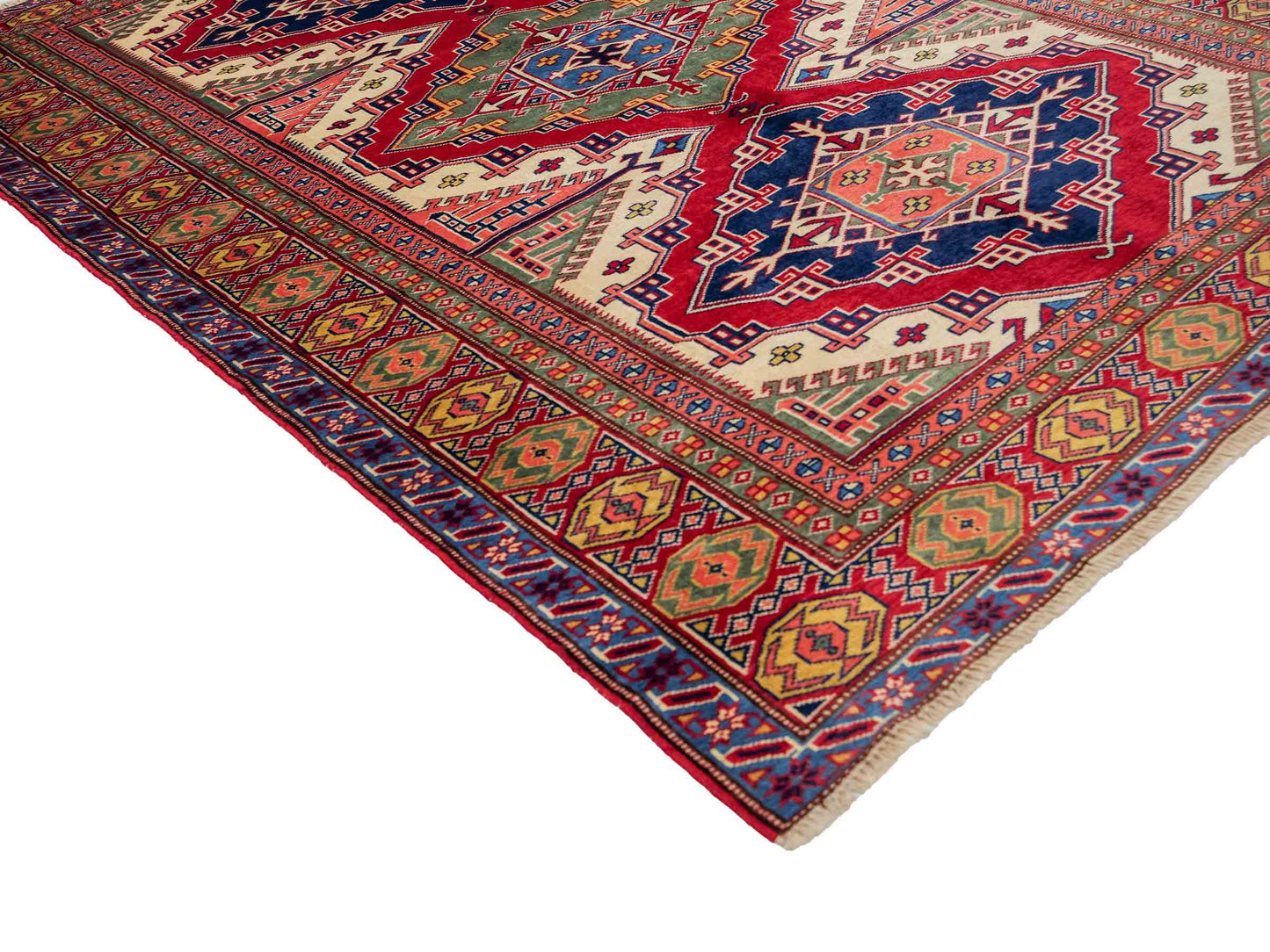 Handgeknüpfter, afghanischer Super Kazak Orientteppich aus Wolle von Khademi. Größe: 177 x 126 cm. Farbe: Rot, gelb, blau, cremeweiß. Verkauf durch JUPITER Intl.