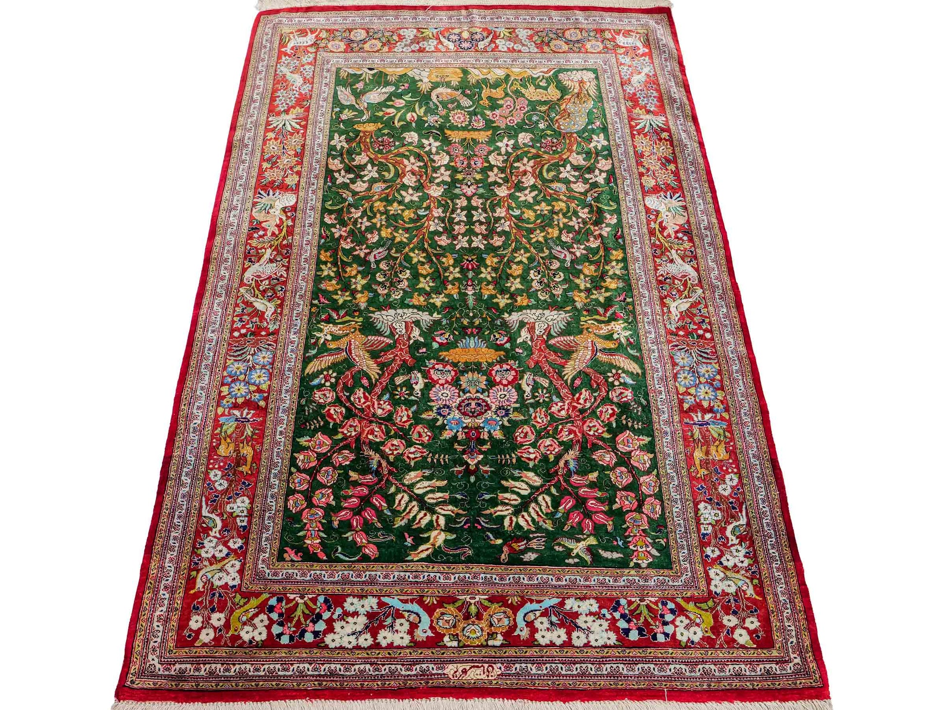 Sehr feiner, handgeknüpfter Khademi Ghom Perserteppich aus Seide, grün, rot. 145x100 cm. Vertrieb durch Jupiter Intl.