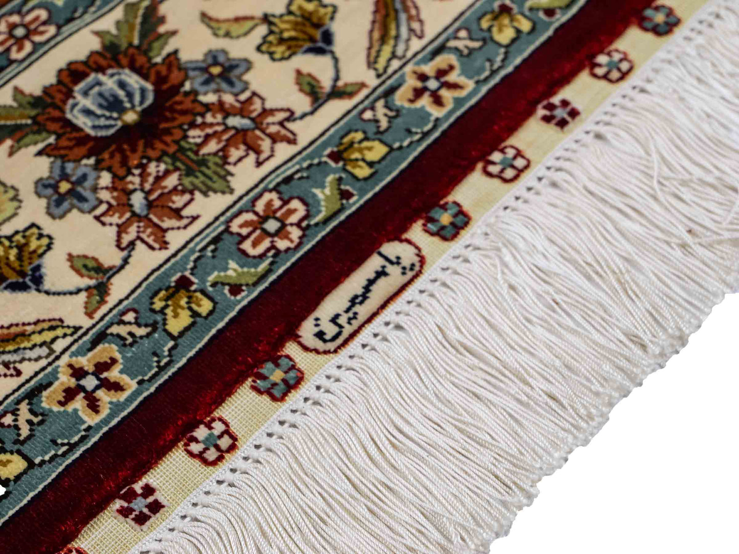 Sehr feiner, handgeknüpfter Khademi Ghom Orientteppich aus Seide, rot, creme. 139x94 cm. Vertrieb durch Jupiter Intl.