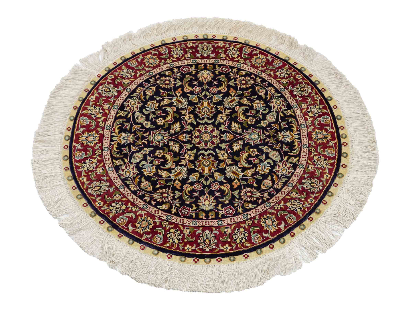 Sehr feiner, handgeknüpfter, runder Khademi Orientteppich mit Ghom Design aus reiner Seide, blau, rot. 61x61 cm. Vertrieb durch Jupiter Intl.