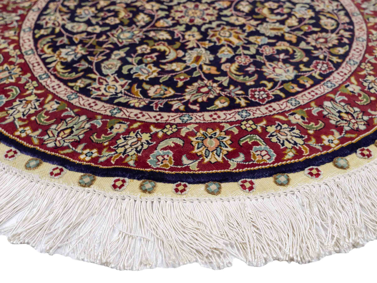 Sehr feiner, handgeknüpfter, runder Khademi Orientteppich mit Ghom Design aus reiner Seide, blau, rot. 61x61 cm. Vertrieb durch Jupiter Intl.