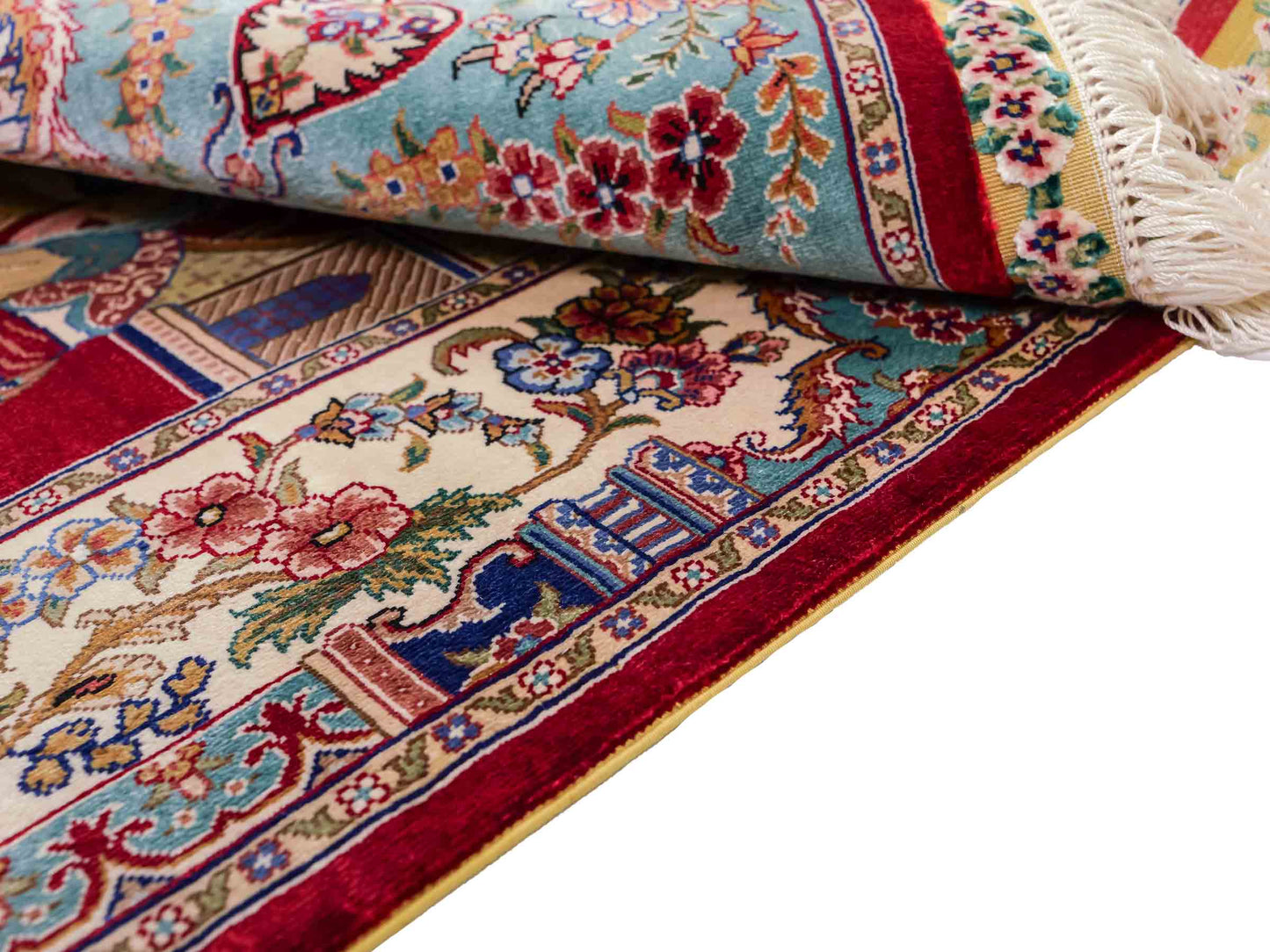 Sehr feiner, handgeknüpfter Khademi Orientteppich mit Ghom Design aus reiner Seide, rot, blau, creme. 92x63 cm. Vertrieb durch Jupiter Intl.