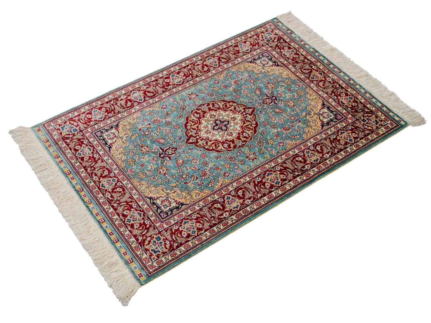 Sehr feiner, handgeknüpfter Khademi Orientteppich mit Ghom Design aus reiner Seide, blau, rot. 94x64 cm. Vertrieb durch Jupiter Intl.