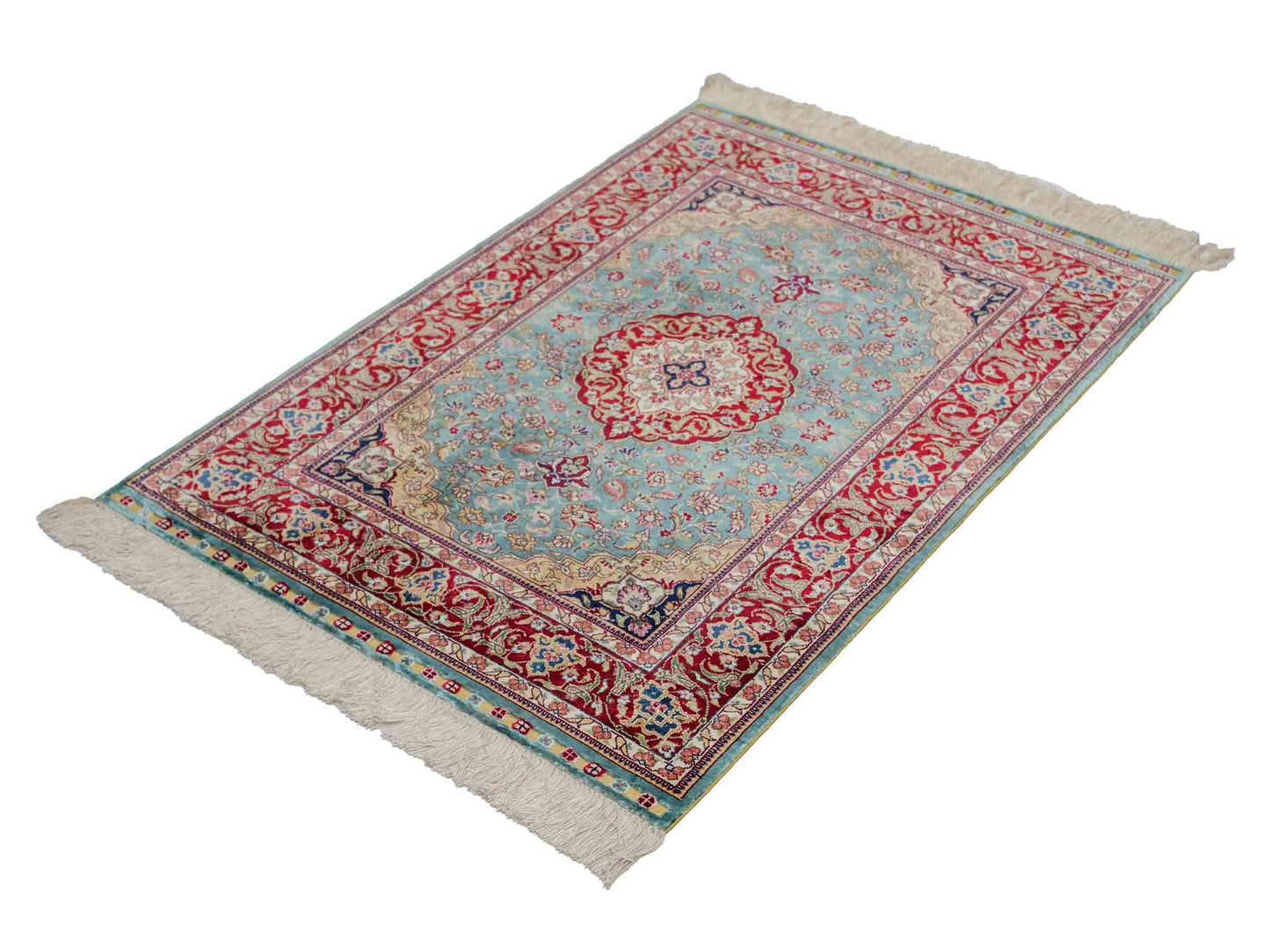 Sehr feiner, handgeknüpfter Khademi Orientteppich mit Ghom Design aus reiner Seide, blau, rot. 94x64 cm. Vertrieb durch Jupiter Intl.