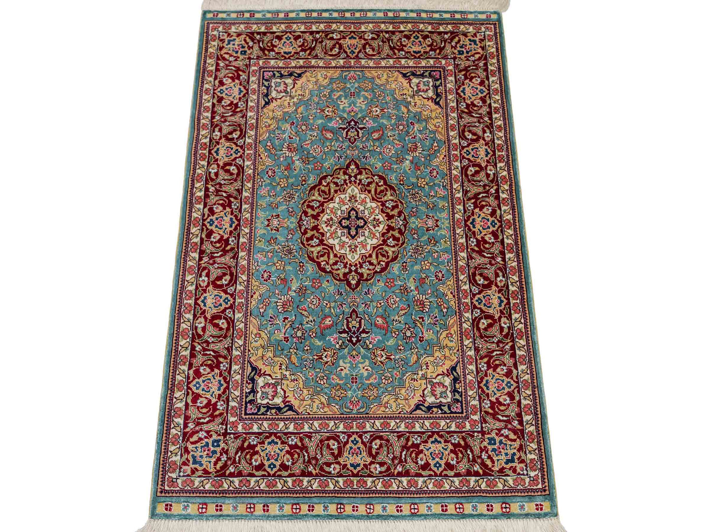 Sehr feiner, handgeknüpfter Khademi Orientteppich mit Ghom Design aus reiner Seide, blau, rot. 94x64 cm. Vertrieb durch Jupiter Intl.