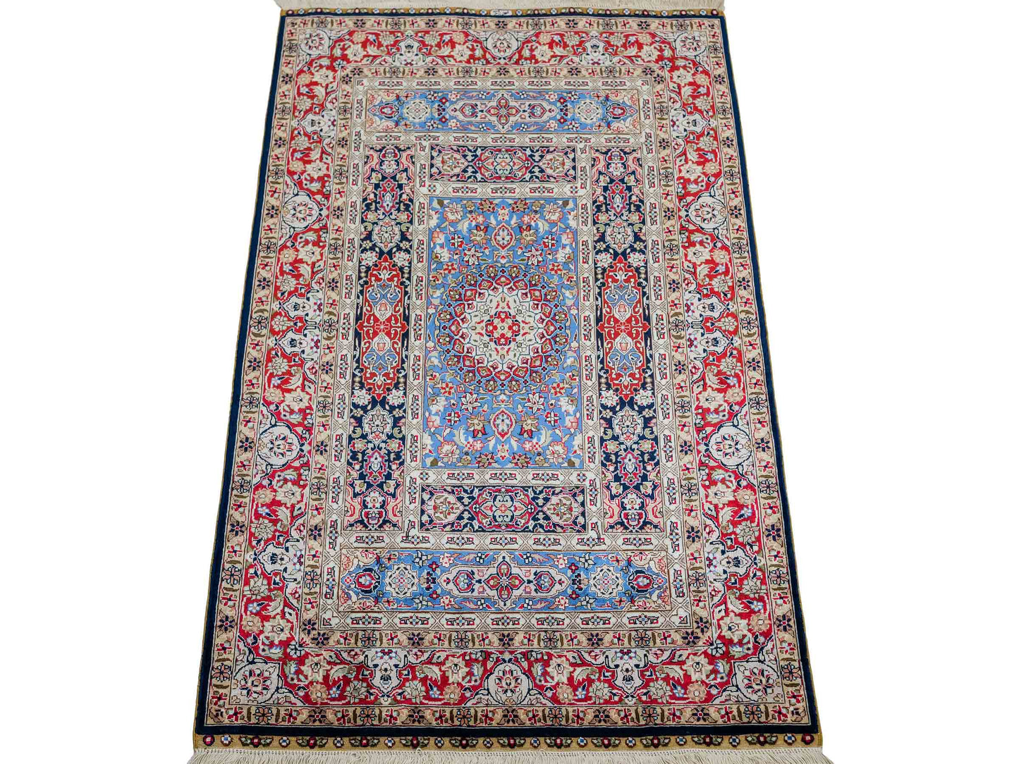 Sehr feiner, handgeknüpfter Khademi Orientteppich mit Ghom Design aus reiner Seide, blau, multicolor. 95x62 cm. Vertrieb durch Jupiter Intl.
