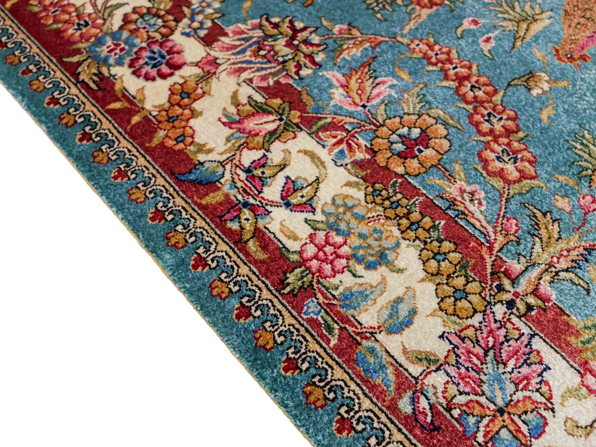 Sehr feiner, handgeknüpfter Khademi Orientteppich mit Hereke Design aus reiner Seide, blau, creme, rot. 112x78 cm. Vertrieb durch Jupiter Intl.