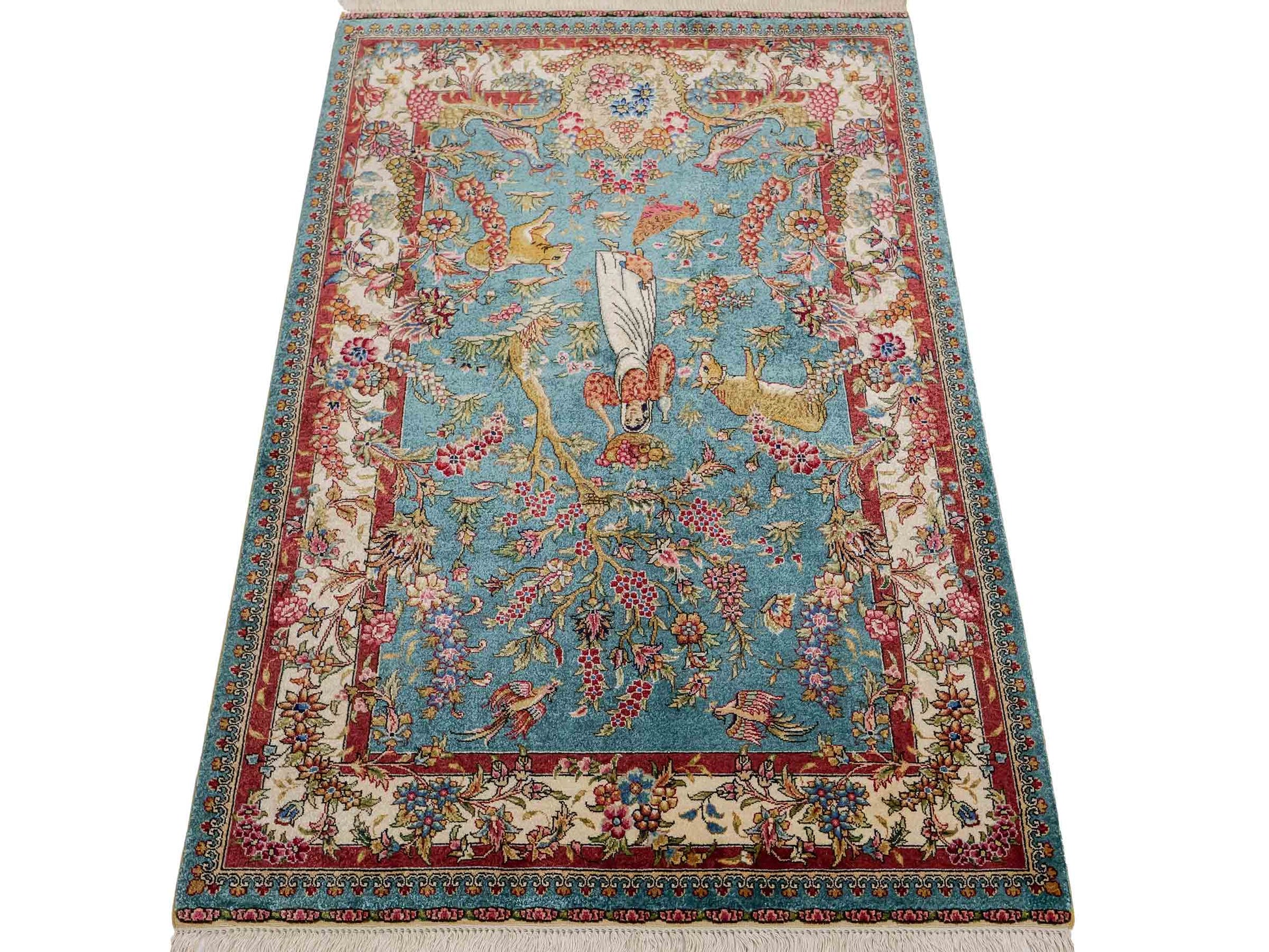 Sehr feiner, handgeknüpfter Khademi Orientteppich mit Hereke Design aus reiner Seide, blau, creme, rot. 112x78 cm. Vertrieb durch Jupiter Intl.