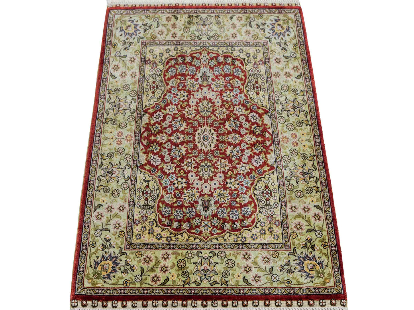 Sehr feiner, handgeknüpfter Khademi Orientteppich mit Hereke Design aus reiner Seide, rot, grün. 62x47 cm. Vertrieb durch Jupiter Intl.