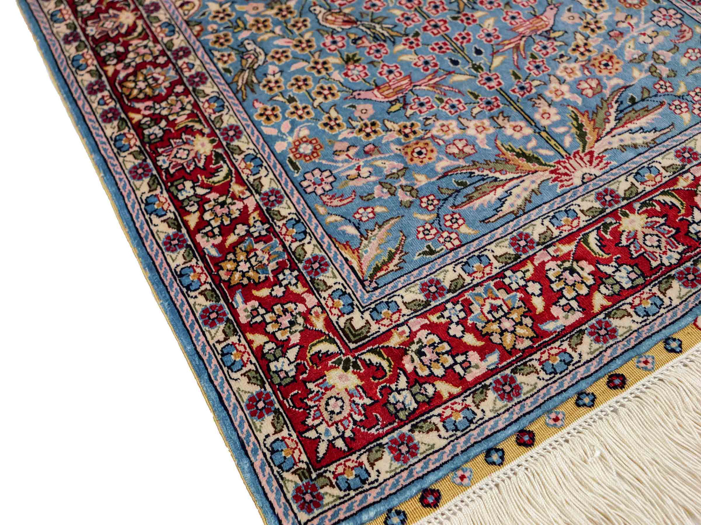 Sehr feiner, handgeknüpfter Khademi Orientteppich mit Hereke Design aus reiner Seide, blau, rot, creme. 65x47 cm. Vertrieb durch Jupiter Intl.