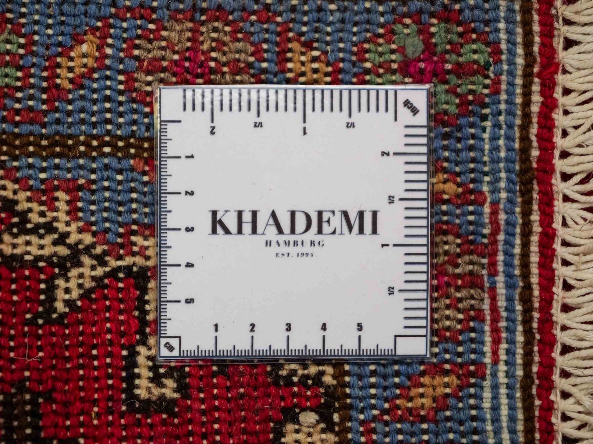 Handgeknüpfter, persischer Hamedan Dorfteppich aus Wolle von Khademi. Größe: 72 x 52 cm. Farbe: Rot. Verkauf durch JUPITER Intl.