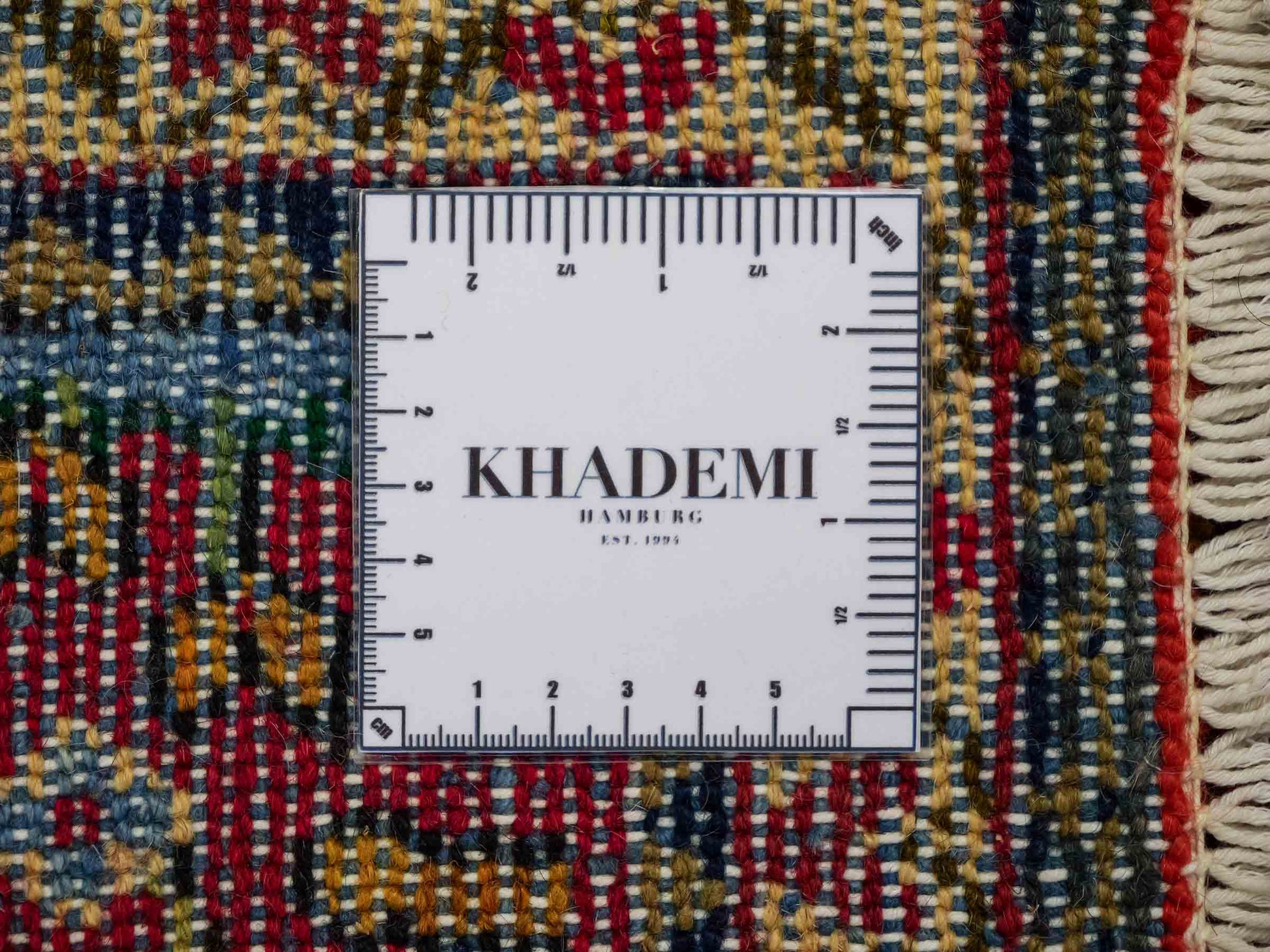 Handgeknüpfter, persischer Hamedan Dorfteppich aus Wolle von Khademi. Größe: 83 x 57 cm. Farbe: Rot. Verkauf durch JUPITER Intl.