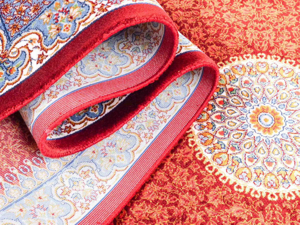 Ghom Läufer-Maschinenteppich "Fereydun" 150 x 50 cm aus pflanzlicher Seide (Viskose) mit Medaillon, Rot-Orange. Teppichnummer: V28RD075H. Persian Luxury Collection by Khademi. Made in Iran / Persia – Vertrieb durch JUPITER Intl.