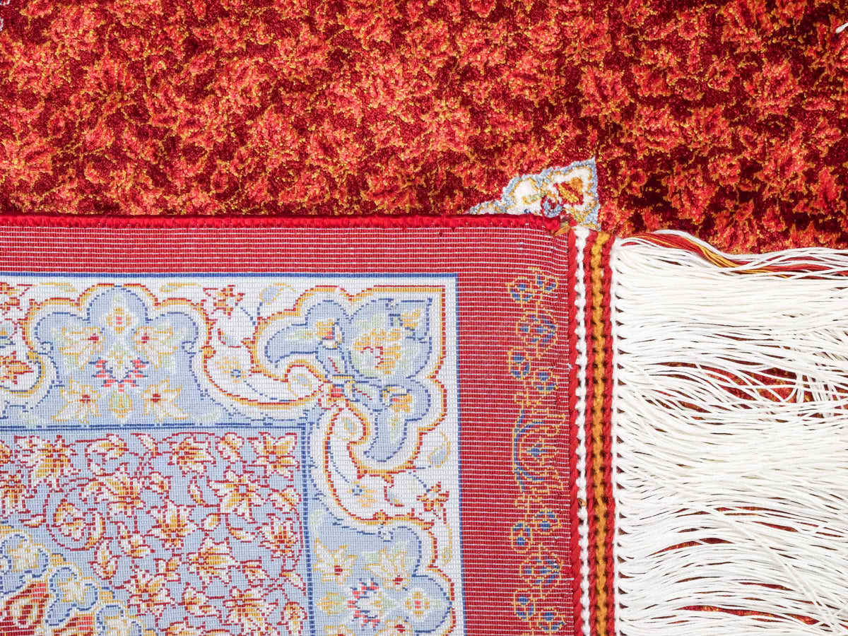 Ghom Läufer-Maschinenteppich "Fereydun" 150 x 50 cm aus pflanzlicher Seide (Viskose) mit Medaillon, Rot-Orange. Teppichnummer: V28RD075H. Persian Luxury Collection by Khademi. Made in Iran / Persia – Vertrieb durch JUPITER Intl.