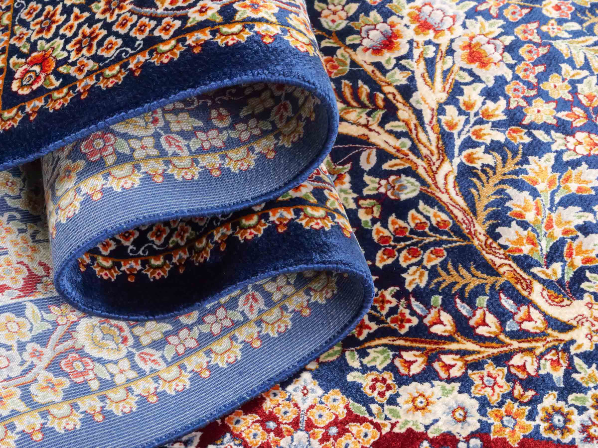 Ghom Läufer-Maschinenteppich "Sam" 150 x 50 cm aus pflanzlicher Seide (Viskose) mit Lebensbaum, Marineblau. Teppichnummer: V75NY075H. Persian Luxury Collection by Khademi. Made in Iran / Persia – Vertrieb durch JUPITER Intl.