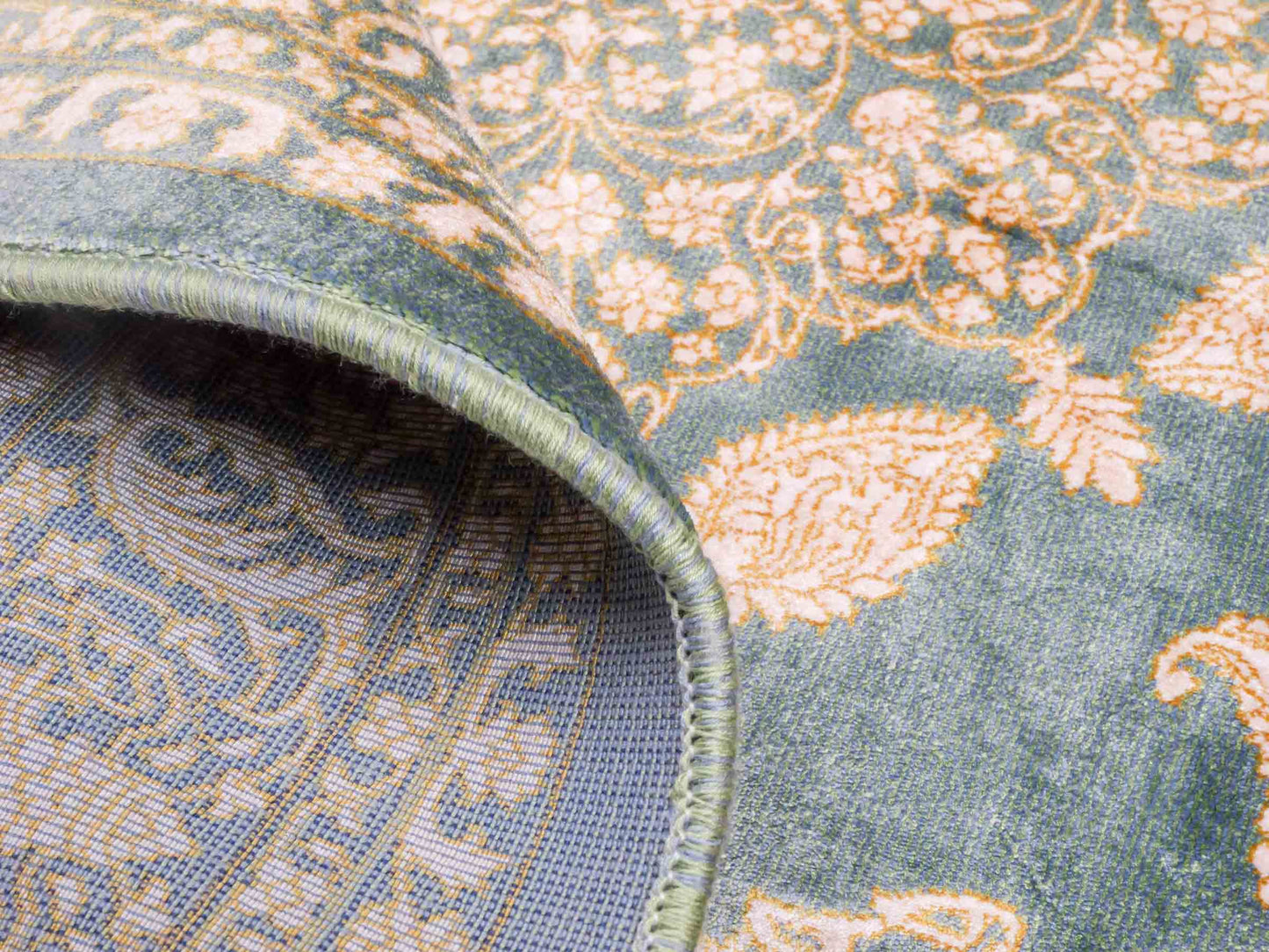 Ghom Maschinenteppich "Anahita" 120 x 80 cm aus pflanzlicher Seide (Viskose) mit Spiegel-Medaillon, Grün. Teppichnummer: V3TL096M. Persian Luxury Collection by Khademi. Made in Iran / Persia – Vertrieb durch JUPITER Intl.