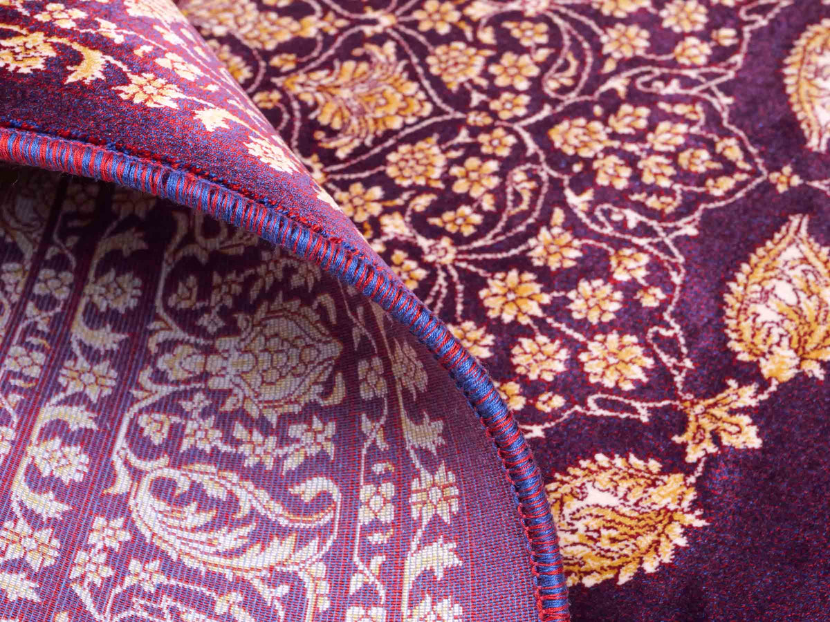 Ghom Maschinenteppich "Anahita" 120 x 80 cm aus pflanzlicher Seide (Viskose) mit Medaillon, Lila-Violett-Gold. Teppichnummer: V3AE096M. Persian Luxury Collection by Khademi. Made in Iran / Persia – Vertrieb durch JUPITER Intl.