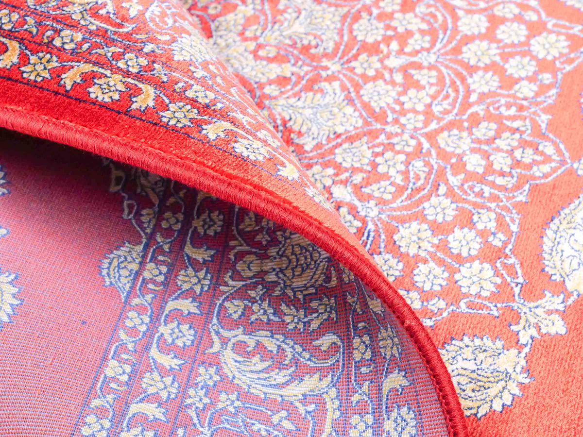 Ghom Maschinenteppich "Anahita" 120 x 80 cm aus pflanzlicher Seide (Viskose) mit Medaillon, Orange-Gold. Teppichnummer: V3BU096M. Persian Luxury Collection by Khademi. Made in Iran / Persia – Vertrieb durch JUPITER Intl.