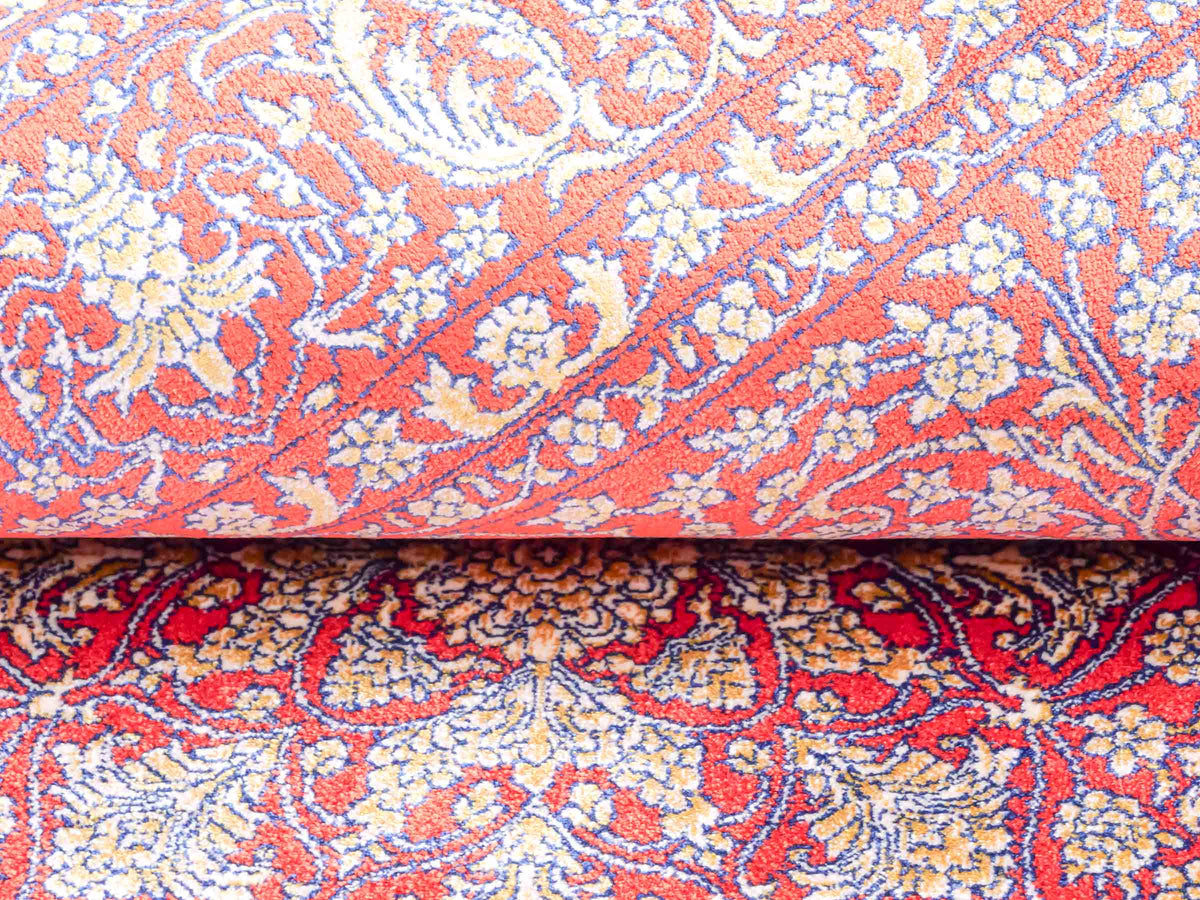 Ghom Maschinenteppich "Anahita" 120 x 80 cm aus pflanzlicher Seide (Viskose) mit Medaillon, Orange-Gold. Teppichnummer: V3BU096M. Persian Luxury Collection by Khademi. Made in Iran / Persia – Vertrieb durch JUPITER Intl.
