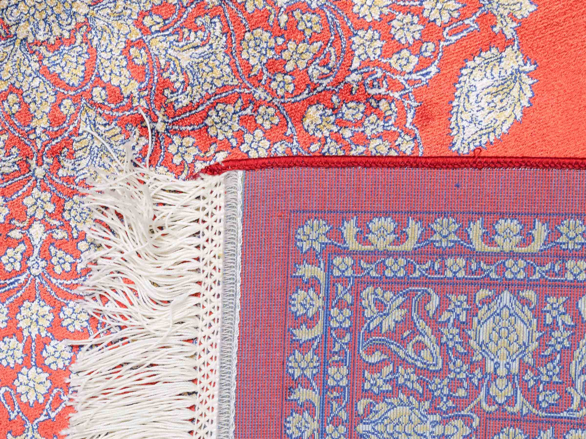 Ghom Maschinenteppich "Anahita" 120 x 80 cm aus pflanzlicher Seide (Viskose) mit Medaillon, Orange-Gold. Teppichnummer: V3BU096M. Persian Luxury Collection by Khademi. Made in Iran / Persia – Vertrieb durch JUPITER Intl.