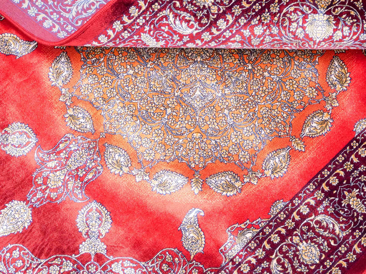 Ghom Maschinenteppich "Anahita" 120 x 80 cm aus pflanzlicher Seide (Viskose) mit Medaillon, Rot-Gold. Teppichnummer: V3RG096M. Persian Luxury Collection by Khademi. Made in Iran / Persia – Vertrieb durch JUPITER Intl.