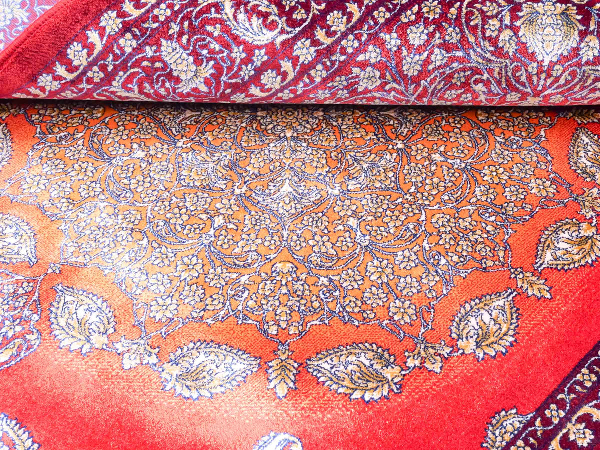 Ghom Maschinenteppich "Anahita" 120 x 80 cm aus pflanzlicher Seide (Viskose) mit Medaillon, Rot-Gold. Teppichnummer: V3RG096M. Persian Luxury Collection by Khademi. Made in Iran / Persia – Vertrieb durch JUPITER Intl.