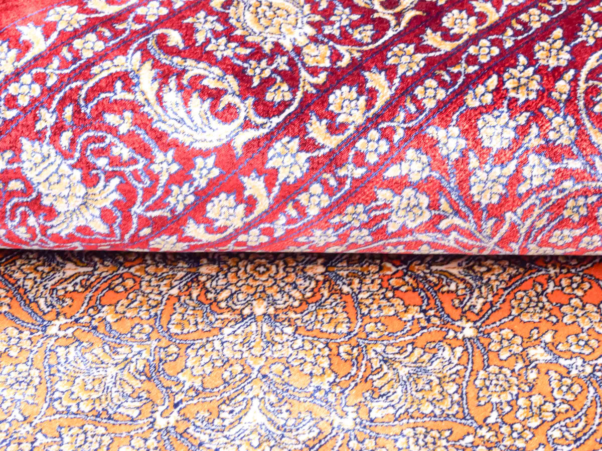 Ghom Maschinenteppich "Anahita" 120 x 80 cm aus pflanzlicher Seide (Viskose) mit Medaillon, Rot-Gold. Teppichnummer: V3RG096M. Persian Luxury Collection by Khademi. Made in Iran / Persia – Vertrieb durch JUPITER Intl.