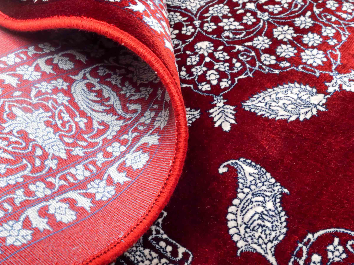 Ghom Maschinenteppich "Anahita" 120 x 80 cm aus pflanzlicher Seide (Viskose) mit Spiegel-Medaillon, Rot. Teppichnummer: V3RD096M. Persian Luxury Collection by Khademi. Made in Iran / Persia – Vertrieb durch JUPITER Intl