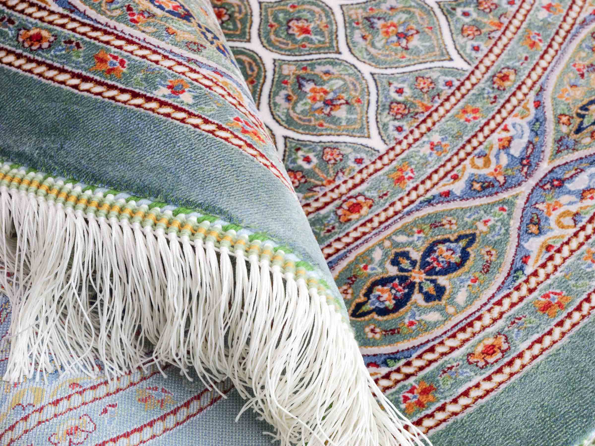 Runder Ghom Maschinenteppich "Ardashir" 100 x 100 cm, mit Medaillon, aus pflanzlicher Seide (Viskose), Türkis. Teppichnummer: V5TL100H. Persian Luxury Collection by Khademi. Made in Iran / Persia – Vertrieb durch JUPITER Intl.