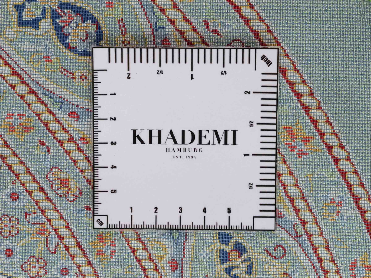 Runder Ghom Maschinenteppich "Ardashir" 100 x 100 cm, mit Medaillon, aus pflanzlicher Seide (Viskose), Türkis. Teppichnummer: V5TL100H. Persian Luxury Collection by Khademi. Made in Iran / Persia – Vertrieb durch JUPITER Intl.