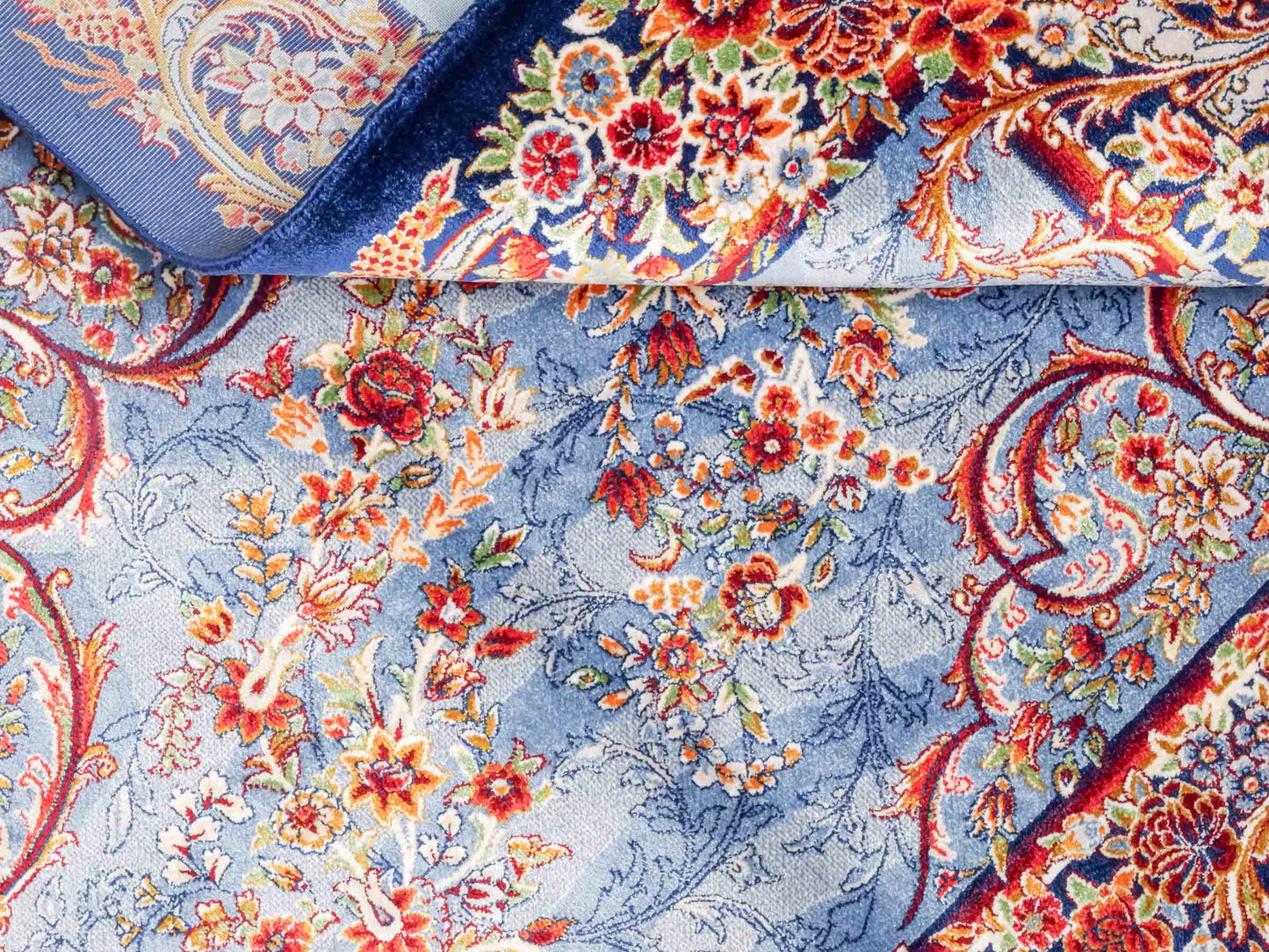Ghom Maschinenteppich "Arsames" 90 x 60 cm aus pflanzlicher Seide (Viskose) mit Allover-Design, Blau-Navy. Teppichnummer: V8BN054H. Persian Luxury Collection by Khademi. Made in Iran / Persia – Vertrieb durch JUPITER Intl.