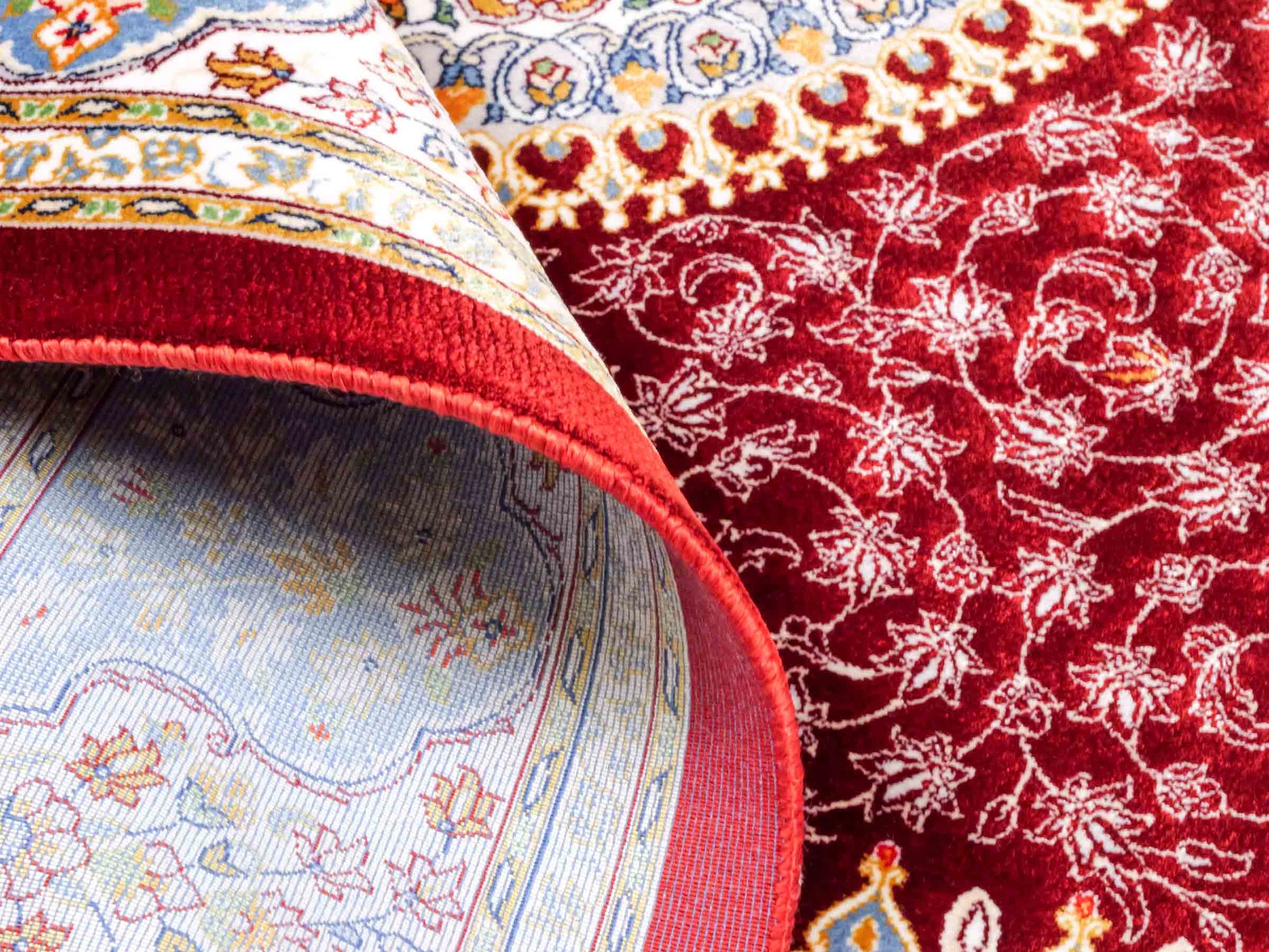 Ghom Maschinenteppich "Arshir" 150 x 100 cm aus pflanzlicher Seide (Viskose) mit Medaillon, Rot. Teppichnummer: V6RD150H. Persian Luxury Collection by Khademi. Made in Iran / Persia – Vertrieb durch JUPITER Intl.
