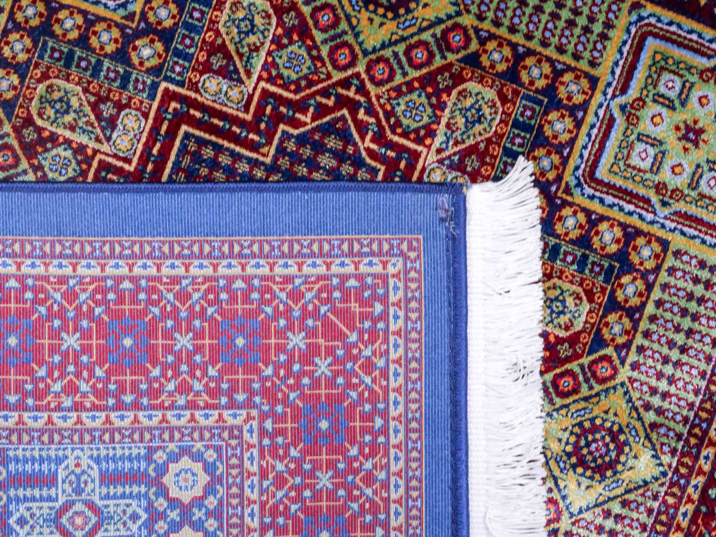 Ghom Maschinenteppich "Aru" 90 x 60 cm aus pflanzlicher Seide (Viskose) mit Medaillon, Navy. Teppichnummer: V9NY054M. Persian Luxury Collection by Khademi. Made in Iran / Persia – Vertrieb durch JUPITER Intl.