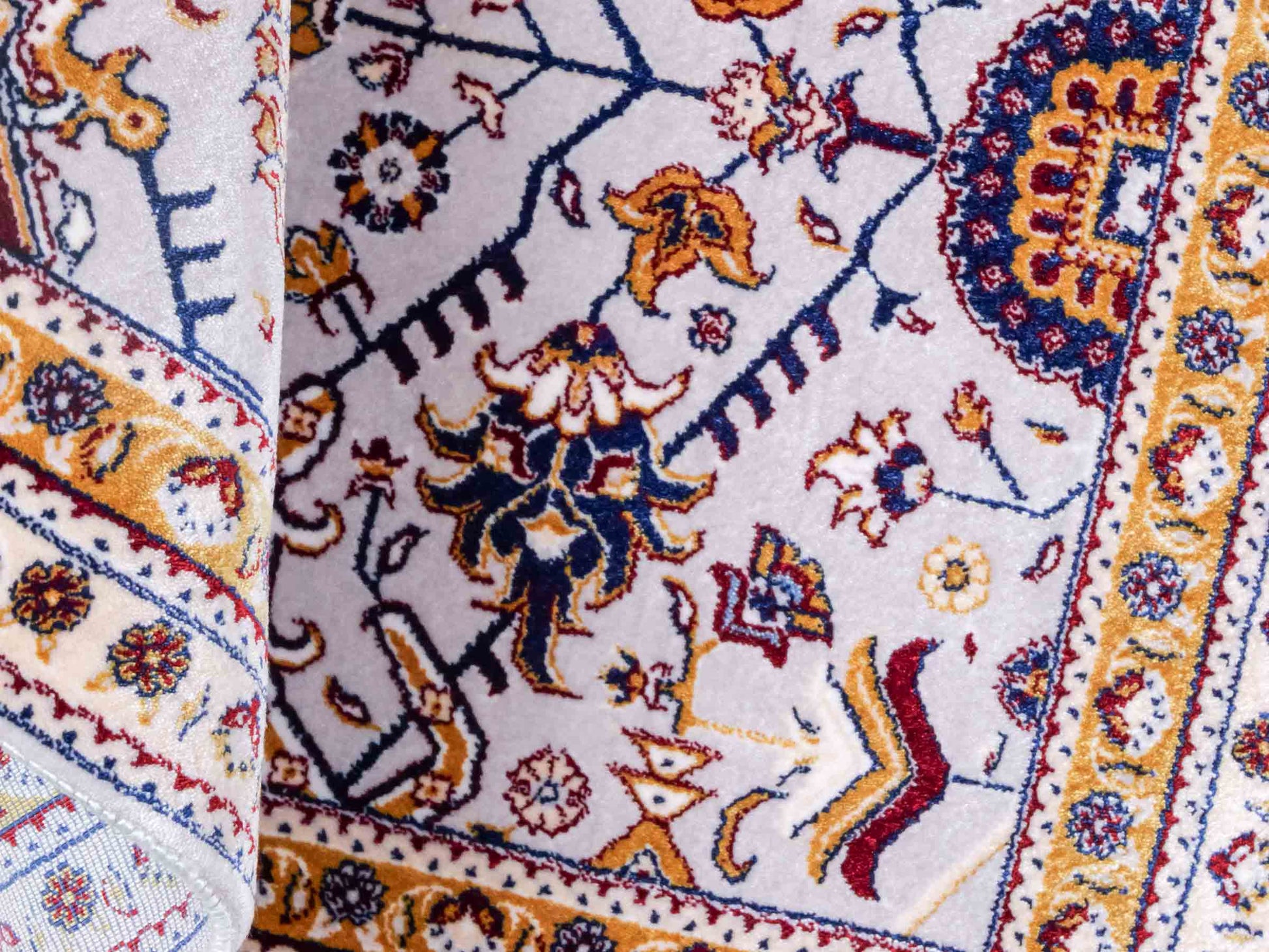 Ghom Maschinenteppich "Azar" 55 x 37 cm aus pflanzlicher Seide (Viskose) mit Allover-Design, Silber-Grau. Teppichnummer: V12SV020H. Persian Luxury Collection by Khademi. Made in Iran / Persia – Vertrieb durch JUPITER Intl.