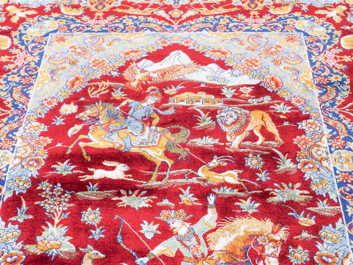 Ghom Maschinenteppich "Banu" 90 x 60 cm, mit Jagdmotiv, Rot, aus pflanzlicher Seide (Viskose), Hand-Finished. Teppichnummer: V13RD054H. Persian Luxury Collection by Khademi. Made in Iran / Persia – Vertrieb durch JUPITER Intl.