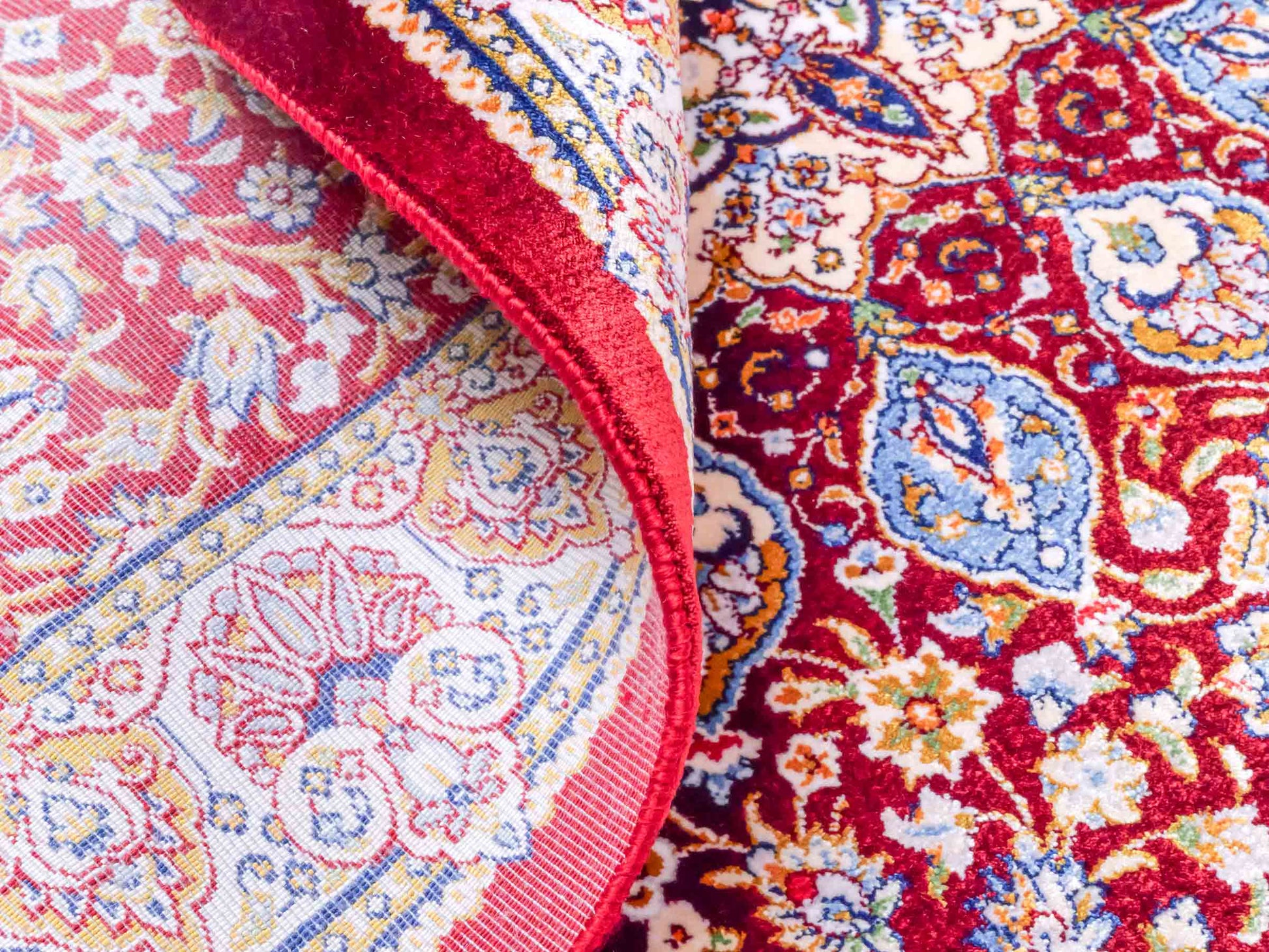 Ghom Maschinenteppich "Borzin" 90 x 60 cm aus pflanzlicher Seide (Viskose) mit Medaillon, Rot. Teppichnummer: V17RD054H. Persian Luxury Collection by Khademi. Made in Iran / Persia – Vertrieb durch JUPITER Intl.