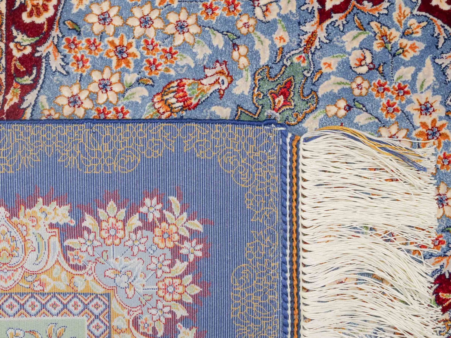 Ghom Maschinenteppich "Farhad" 90 x 60 cm aus pflanzlicher Seide (Viskose). Wandteppich mit floralem Bildmotiv, Navy-Blau. Teppichnummer: V26NY054H. Persian Luxury Collection by Khademi. Made in Iran / Persia – Vertrieb durch JUPITER Intl.
