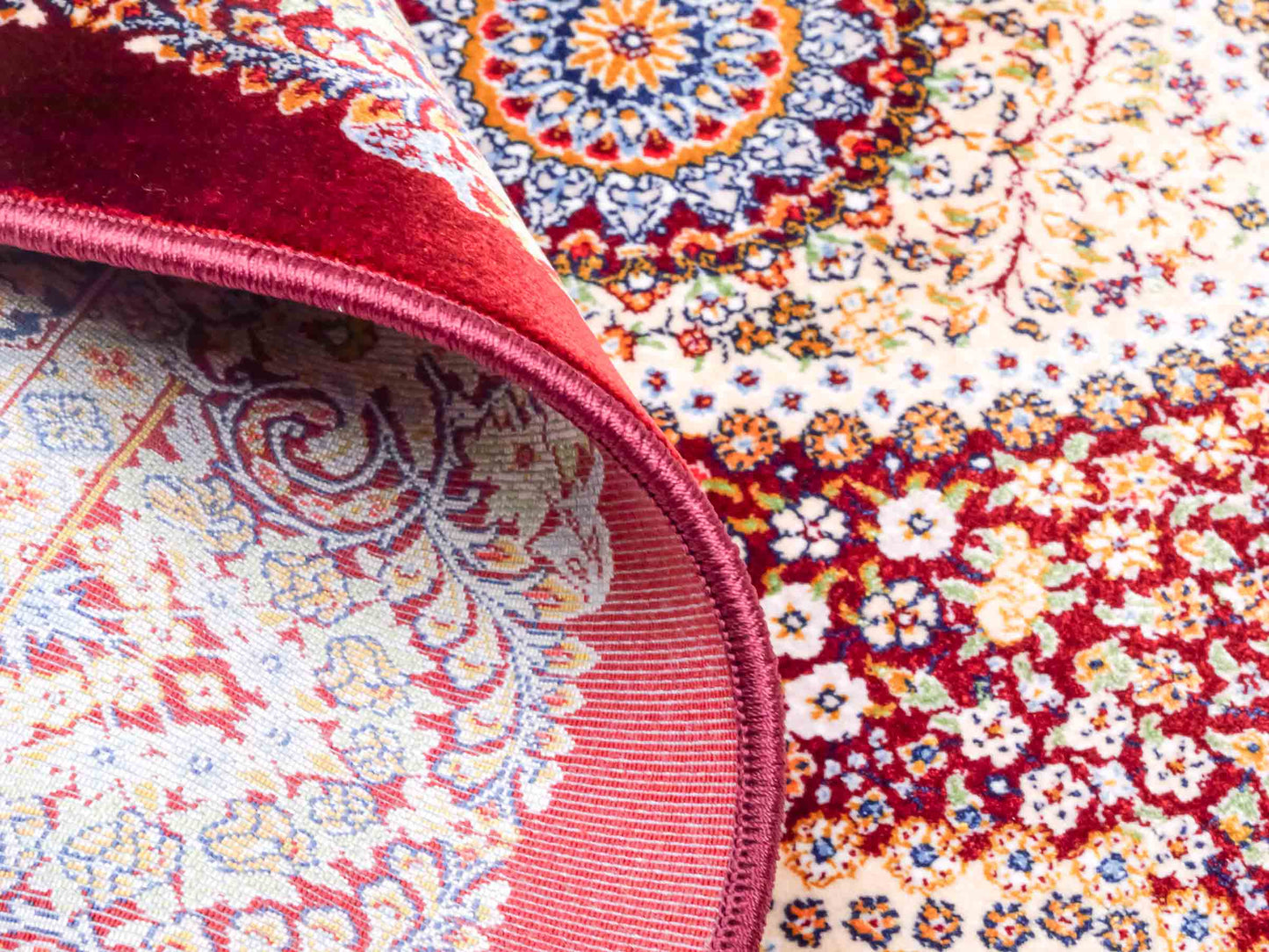 Ghom Maschinenteppich "Farr" 90 x 60 cm aus pflanzlicher Seide (Viskose) mit Medaillon, Rot. Teppichnummer: V27RD054M. Persian Luxury Collection by Khademi. Made in Iran / Persia – Vertrieb durch JUPITER Intl.