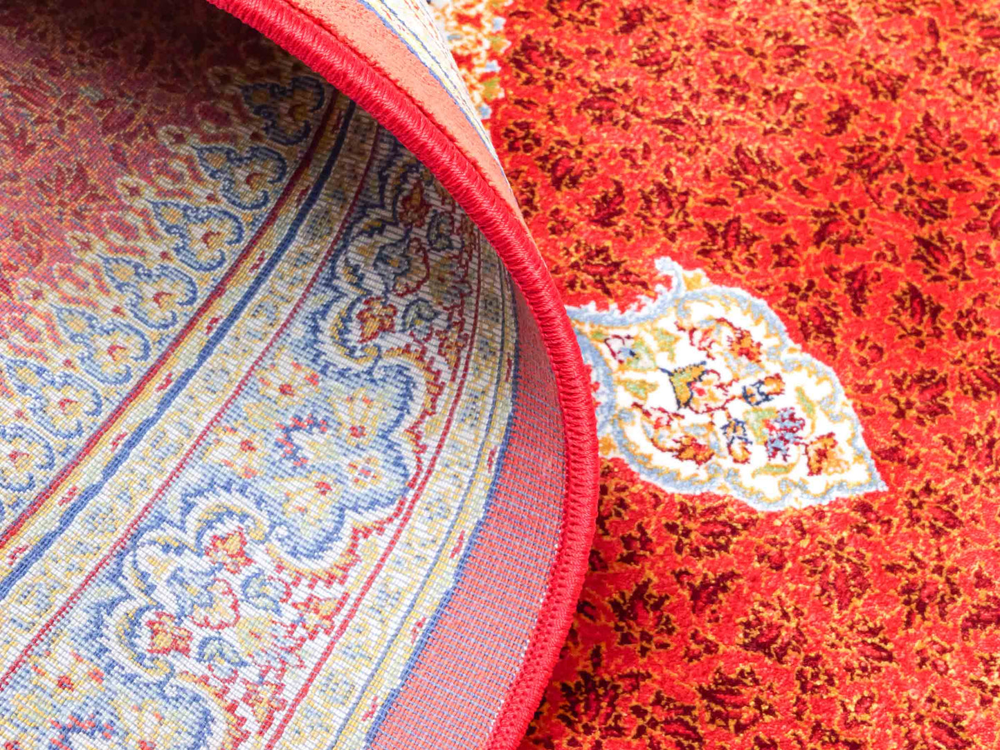 Ghom Maschinenteppich "Fereydun" 90 x 60 cm aus pflanzlicher Seide (Viskose) mit Medaillon, Orange. Teppichnummer: V28BU054M. Persian Luxury Collection by Khademi. Made in Iran / Persia – Vertrieb durch JUPITER Intl.