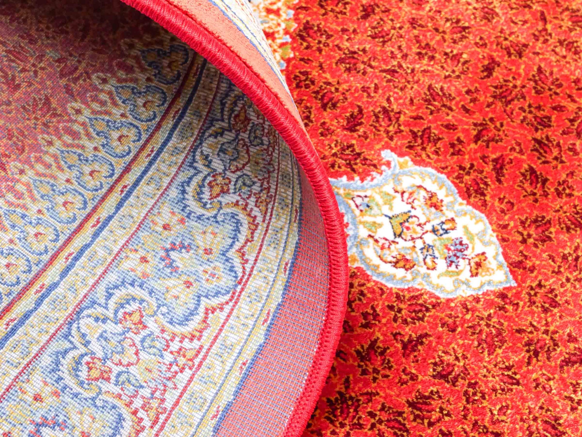 Ghom Maschinenteppich "Fereydun" 90 x 60 cm aus pflanzlicher Seide (Viskose) mit Medaillon, Orange. Teppichnummer: V28BU054M. Persian Luxury Collection by Khademi. Made in Iran / Persia – Vertrieb durch JUPITER Intl.