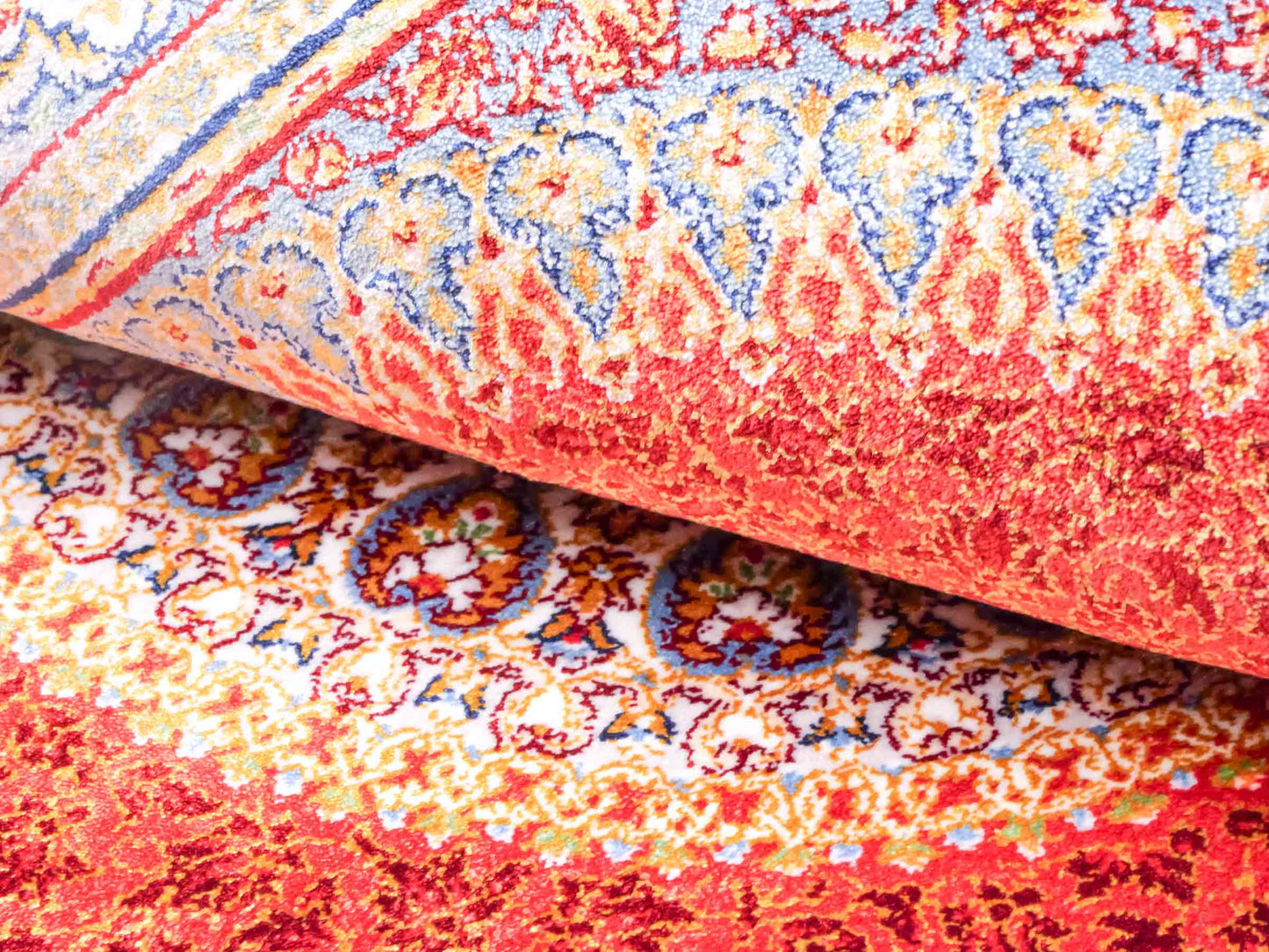 Ghom Maschinenteppich "Fereydun" 90 x 60 cm aus pflanzlicher Seide (Viskose) mit Medaillon, Orange. Teppichnummer: V28BU054M. Persian Luxury Collection by Khademi. Made in Iran / Persia – Vertrieb durch JUPITER Intl.