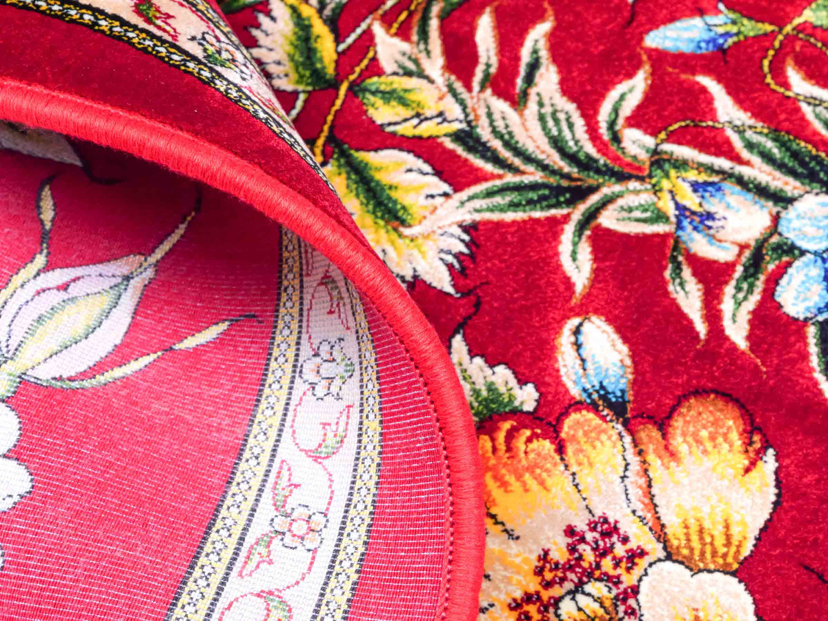 Ghom Maschinenteppich "Jamshid" 90 x 60 cm aus pflanzlicher Seide (Viskose) mit floralem Bildmotiv, Rot. Teppichnummer: V48RD054M Persian Luxury Collection by Khademi. Made in Iran / Persia – Vertrieb durch JUPITER Intl.