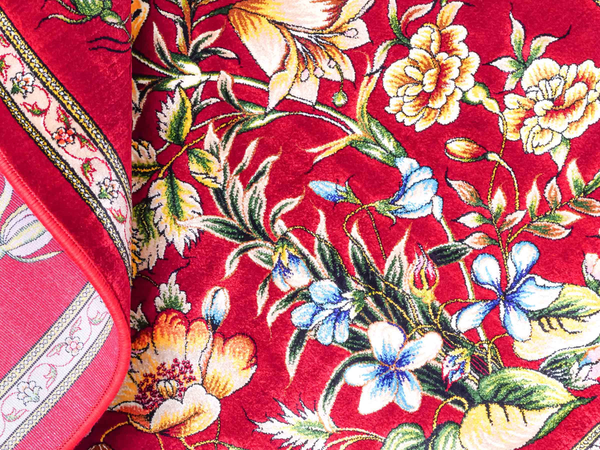 Ghom Maschinenteppich "Jamshid" 90 x 60 cm aus pflanzlicher Seide (Viskose) mit floralem Bildmotiv, Rot. Teppichnummer: V48RD054M Persian Luxury Collection by Khademi. Made in Iran / Persia – Vertrieb durch JUPITER Intl.