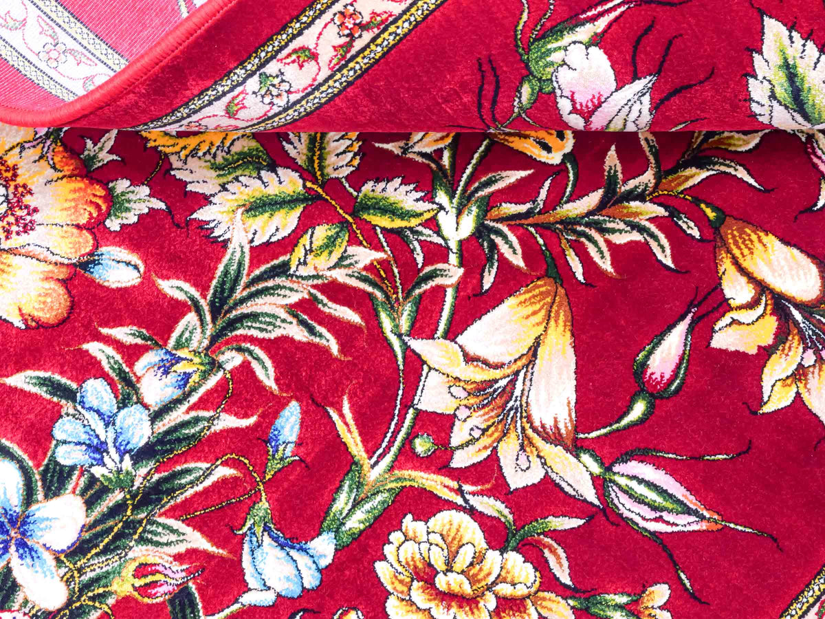 Ghom Maschinenteppich "Jamshid" 90 x 60 cm aus pflanzlicher Seide (Viskose) mit floralem Bildmotiv, Rot. Teppichnummer: V48RD054M Persian Luxury Collection by Khademi. Made in Iran / Persia – Vertrieb durch JUPITER Intl.