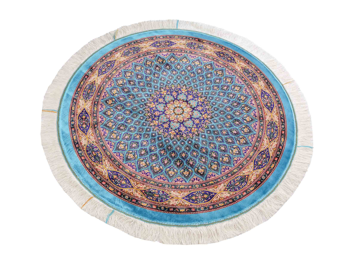 Runder Ghom Maschinenteppich "Kavus" 100 x 100 cm, mit Medaillon, aus pflanzlicher Seide (Viskose), Blau-Grün. Teppichnummer: V50TG100H. Persian Luxury Collection by Khademi. Made in Iran / Persia – Vertrieb durch JUPITER Intl.