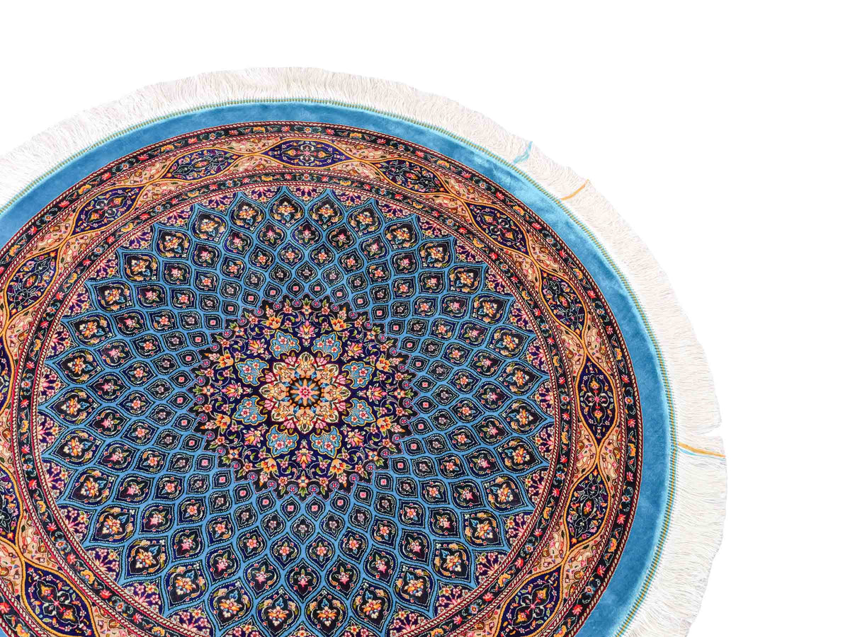 Runder Ghom Maschinenteppich "Kavus" 100 x 100 cm, mit Medaillon, aus pflanzlicher Seide (Viskose), Blau-Grün. Teppichnummer: V50TG100H. Persian Luxury Collection by Khademi. Made in Iran / Persia – Vertrieb durch JUPITER Intl.