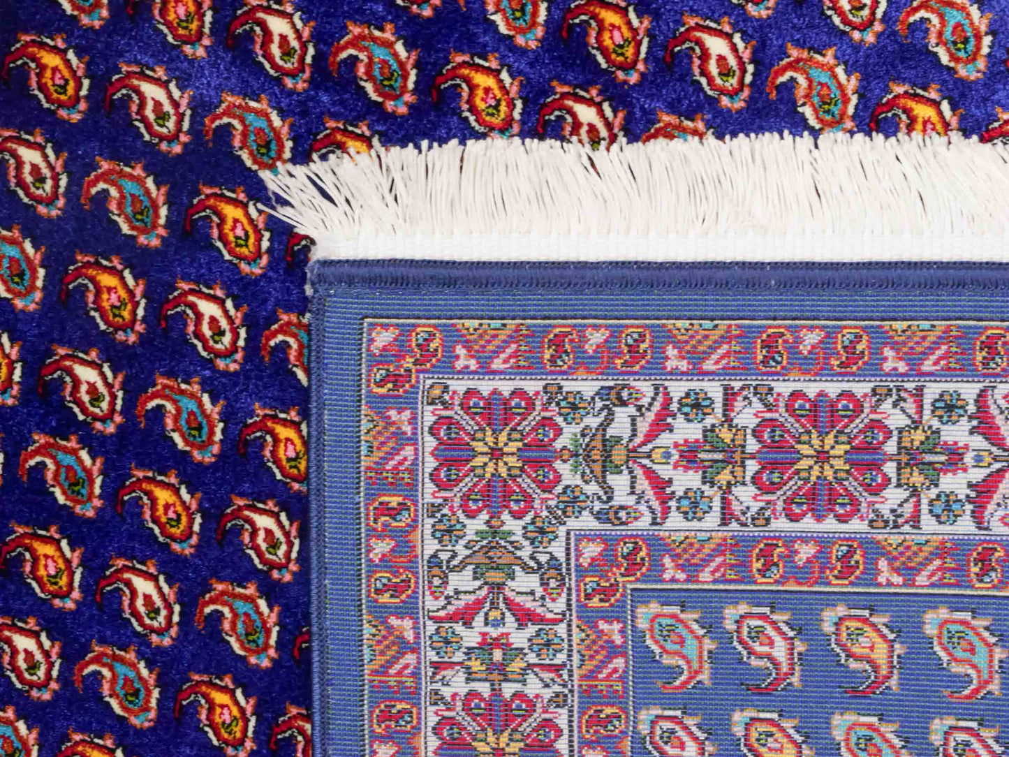 Ghom Maschinenteppich "Lohrasp" 90 x 60 cm aus pflanzlicher Seide (Viskose), Allover-Design (Boteh Mir), Dunkelblau. Teppichnummer: V54DB054M. Persian Luxury Collection by Khademi. Made in Iran / Persia – Vertrieb durch JUPITER Intl.
