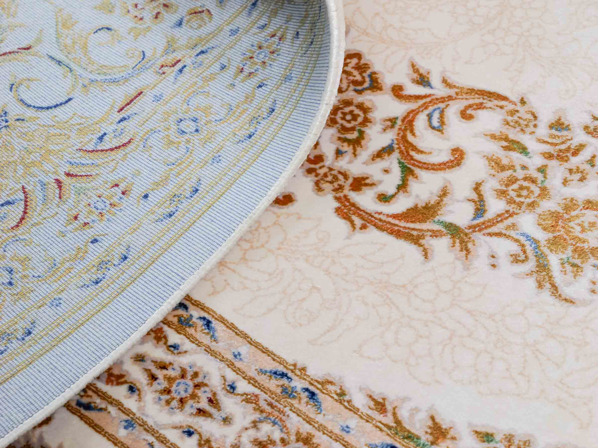 Ghom Maschinenteppich "Pari" 225 x 150 cm, mit Medaillon, aus pflanzlicher Seide (Viskose), Cremeweiß/Gold. Teppichnummer: V68CR338H. Persian Luxury Collection by Khademi. Made in Iran / Persia – Vertrieb durch JUPITER Intl.